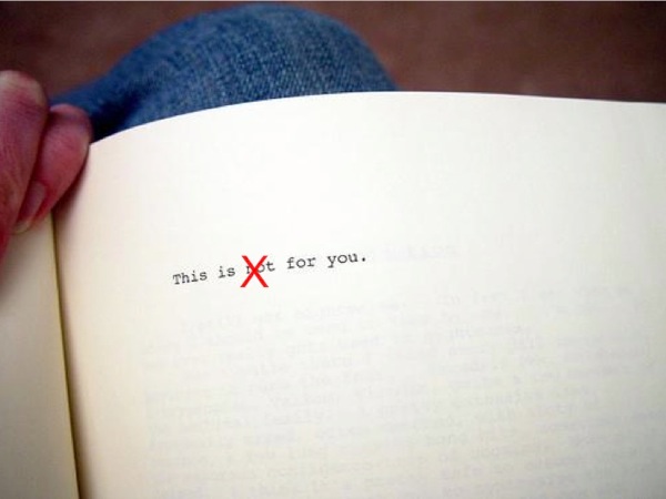Photograph of the dedicatory page of House of Leaves, with the *not* crossed out