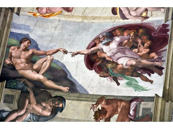 Photograph of *The Creation of Adam* from the ceiling of the Sistine Chapel